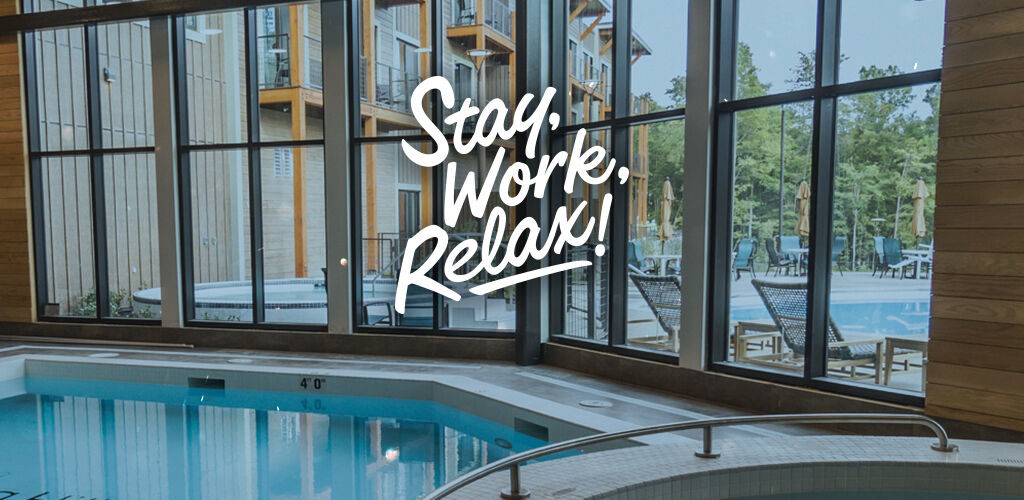 indoor pool with text overtop saying "Stay, Work, Relax!"